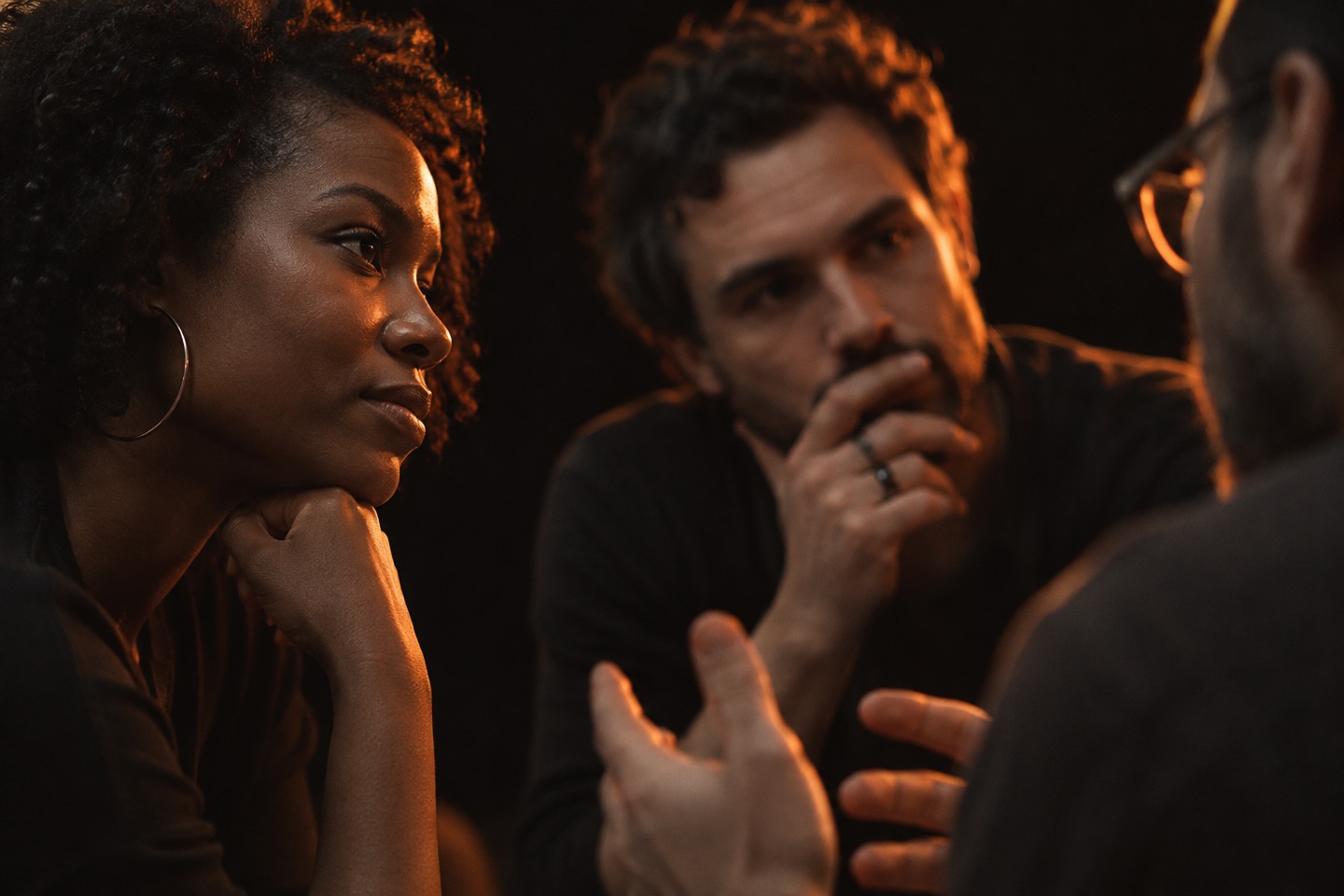 Conceptual close-up of a small group engaged in discussion