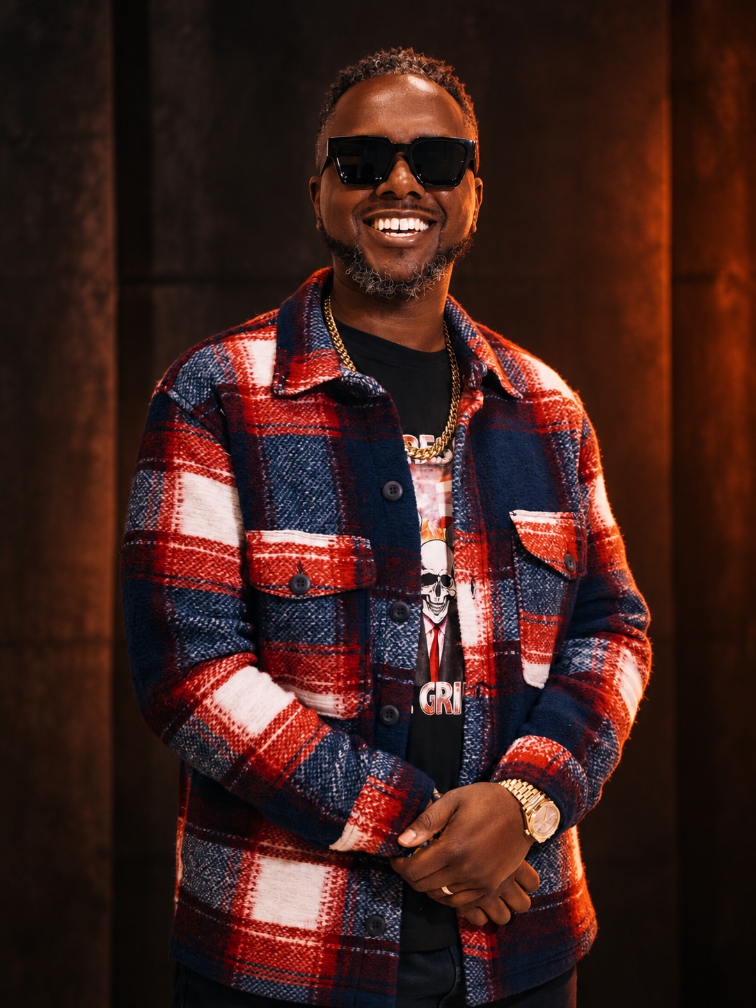 Gerald ‘The Sound’ Keys wearing sunglasses and a plaid jacket